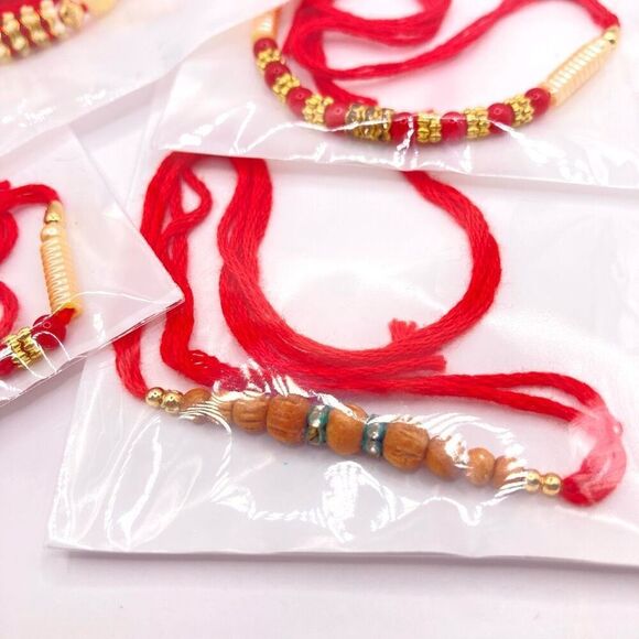 Set of 4 red thread Raakhi indie bracelets - Picture 2 of 4